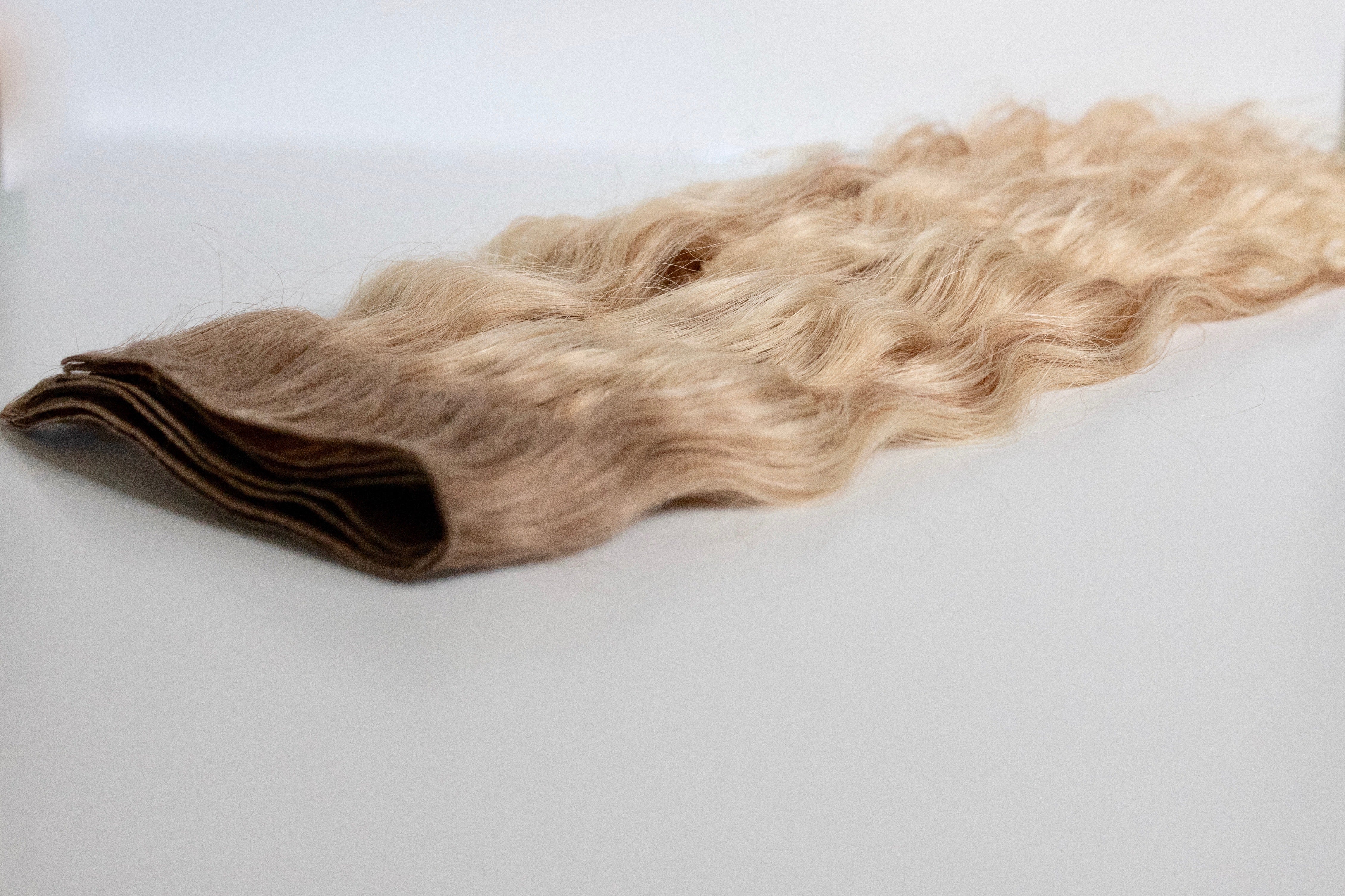 Beach Wave Hand Tied Weft - 10/8CBL (Cool Blonde Mix)
